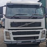 Close-up of Volvo FM 400 front badge and grille, white cab, clean condition, ex-fleet horse for sale