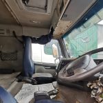 Volvo FM 400 dashboard and steering wheel from driver seat, I-Shift gear lever, well-maintained interior